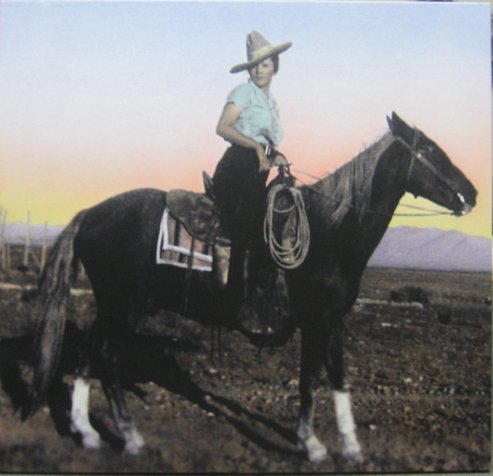 cowgirlonhorseback.jpg